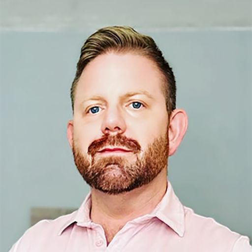 A headshot image of Dustin Hawkins