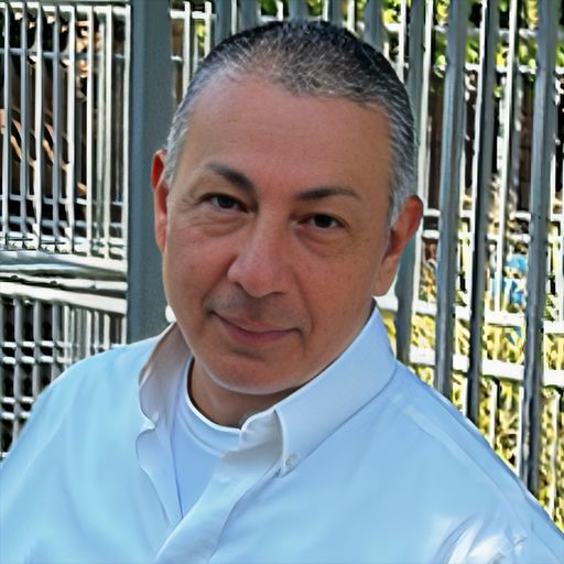 A headshot image of Mario De Leon