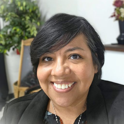 A headshot image of Emma Ruiz