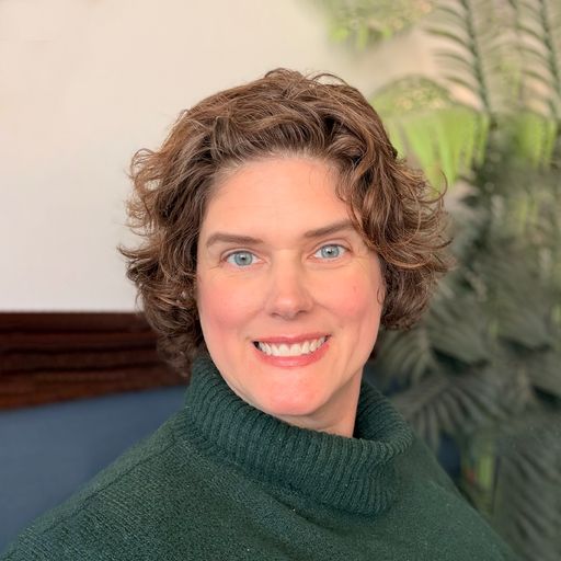 A headshot image of Amie Hanson