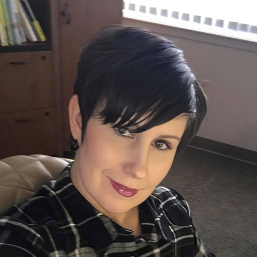 A headshot image of Michelle Henriques