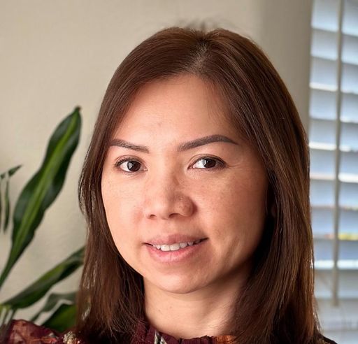 A headshot image of Janine Tran