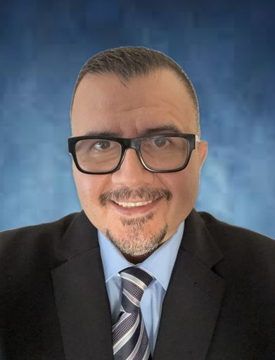 A headshot image of Ramon Ortega-Caballero