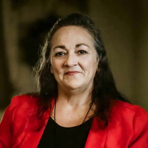 A headshot image of Tina Green
