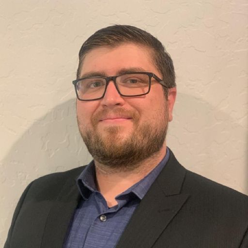 A headshot image of Nickolas Persons