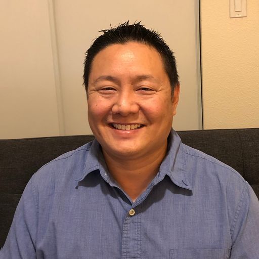 A headshot image of Alan Wong