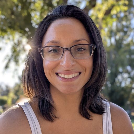 A headshot image of Tiffany Olivares