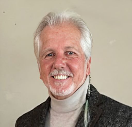 A headshot image of Patrick Talbot