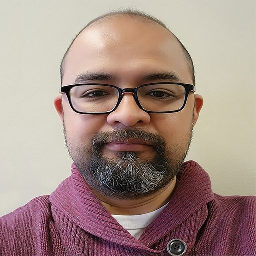 A headshot image of Raul Rodriguez