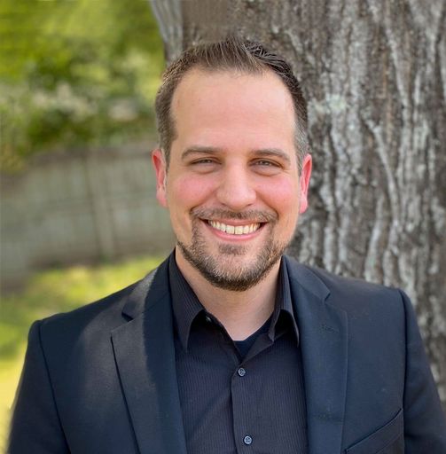 A headshot image of Michael Sartin