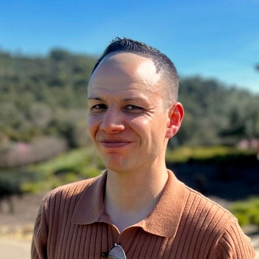 A headshot image of Paul Martinez