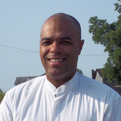 A headshot image of George Martinez