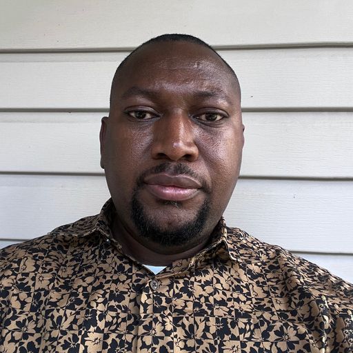 A headshot image of Nelson Nwosu