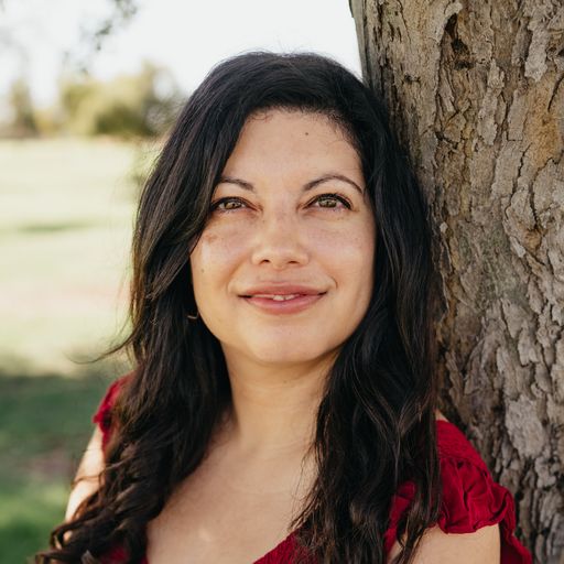A headshot image of Ariana De Andrado-Byars