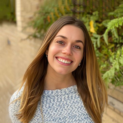 A headshot image of Chloe Meshel-Wood