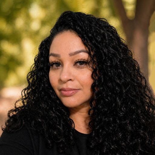 A headshot image of Awilda Cuevas Hughes