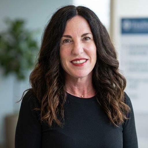A headshot image of Carrie Sundberg