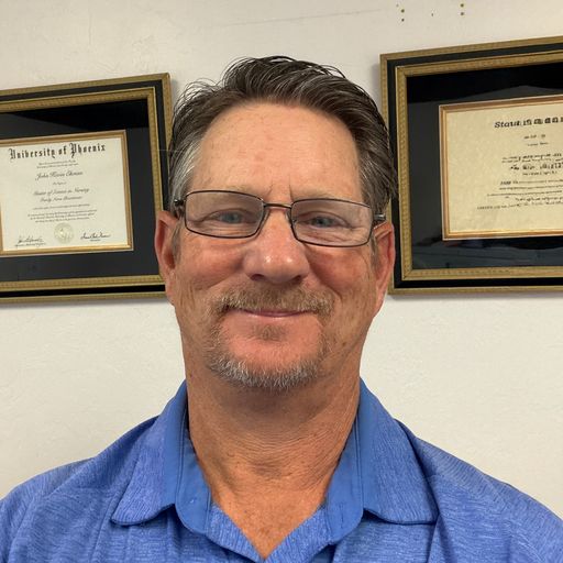 A headshot image of John Ekman