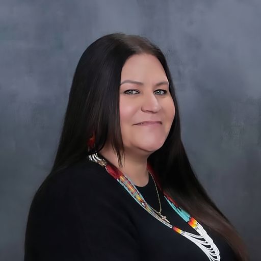 A headshot image of Tesi Taylor Long