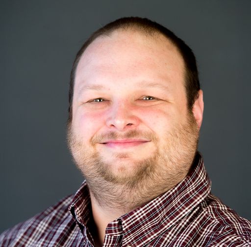 A headshot image of John Stinebaugh