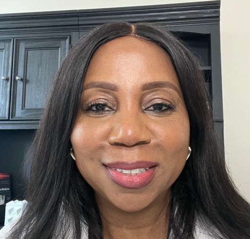 A headshot image of Maggie Alexander