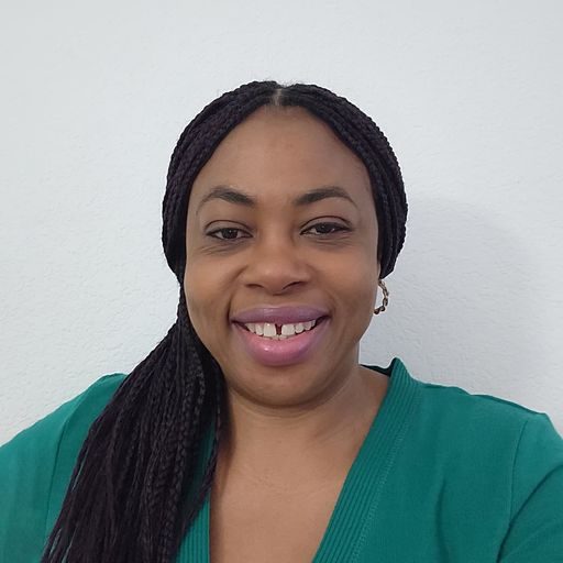 A headshot image of Esther Uangbaoje