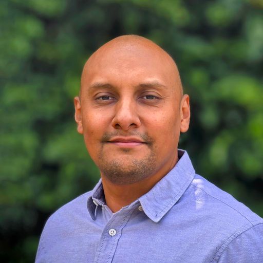 A headshot image of Charles Zamora