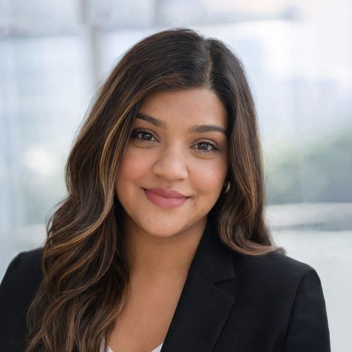 A headshot image of Nina Dhanota-Mann
