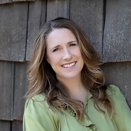 A headshot image of Lara Clayton