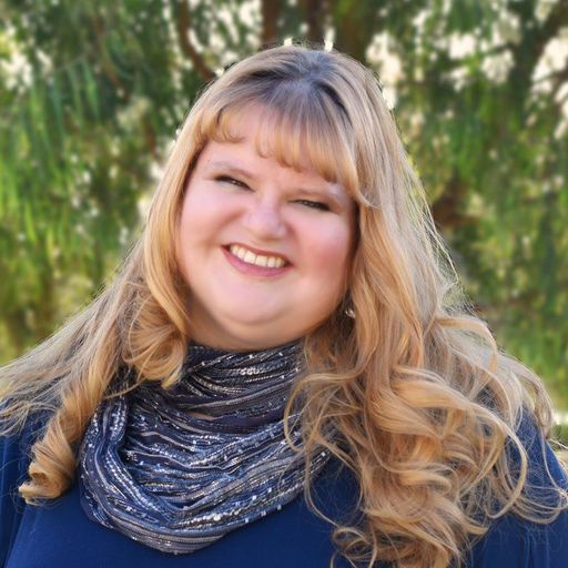 A headshot image of Kristi Sanford