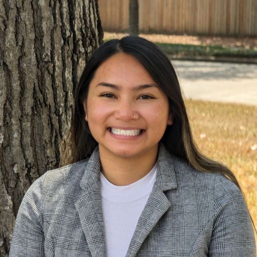 A headshot image of Jenisha Aguon