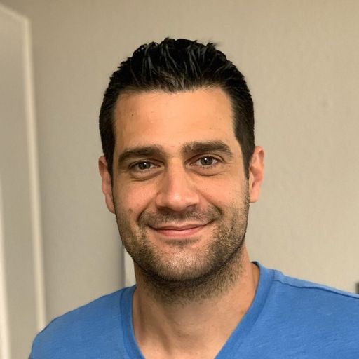 A headshot image of Joshua Garth