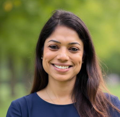 A headshot image of Nidhi Goel