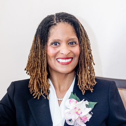 A headshot image of TréSina Steger