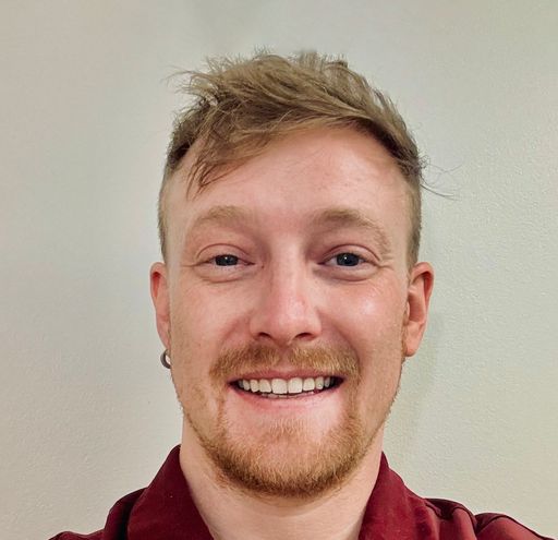 A headshot image of Luke Xavier