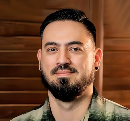 A headshot image of Renzo Ortega