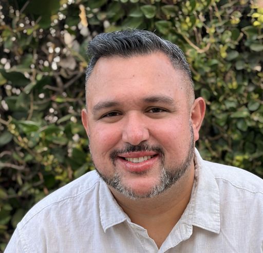 A headshot image of Edgar Cazares