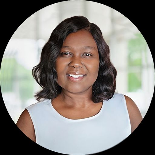 A headshot image of Regine Blaise