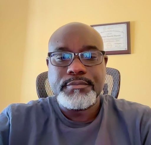 A headshot image of Emmanuel Acquaye