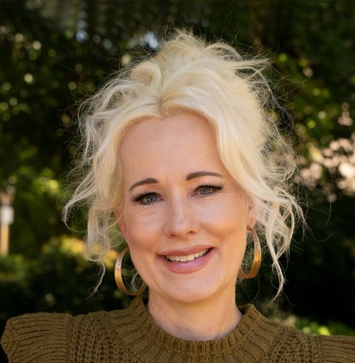 A headshot image of Karen Corona