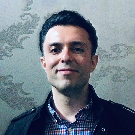 A headshot image of Amir Faghfoory