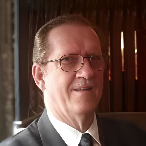 A headshot image of Milton Gordon