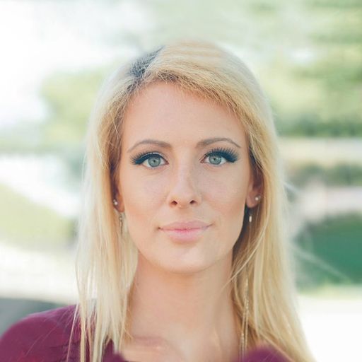 A headshot image of Caitlyn Huettler