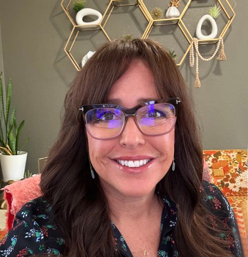 A headshot image of Katy McGuire