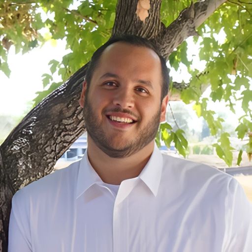 A headshot image of Michael Salaz