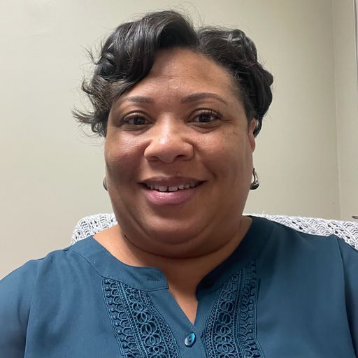 A headshot image of Nikki Watkins