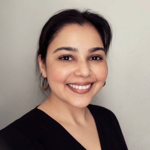 A headshot image of Malavika Lopez