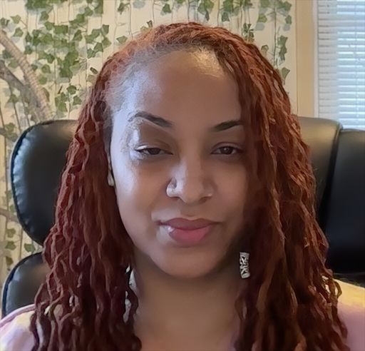A headshot image of Shavon Coxton